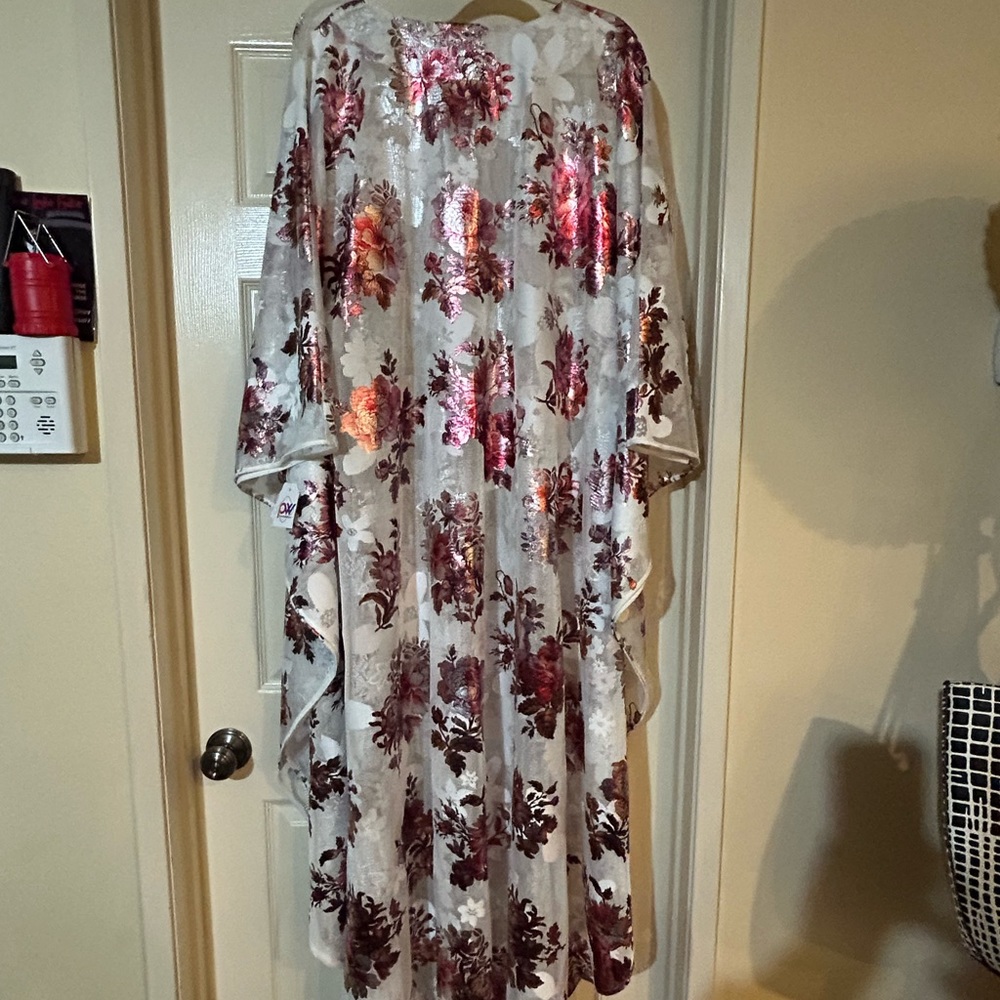 Floor length kaftan in beautiful white and rose gold colors.